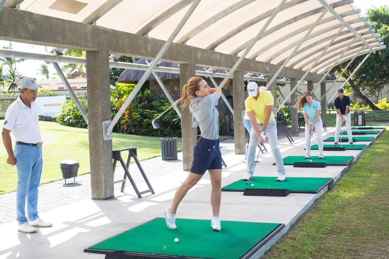 Constance Prince Maurice Poste de Flacq Exterior foto Golfers practicing at a driving range