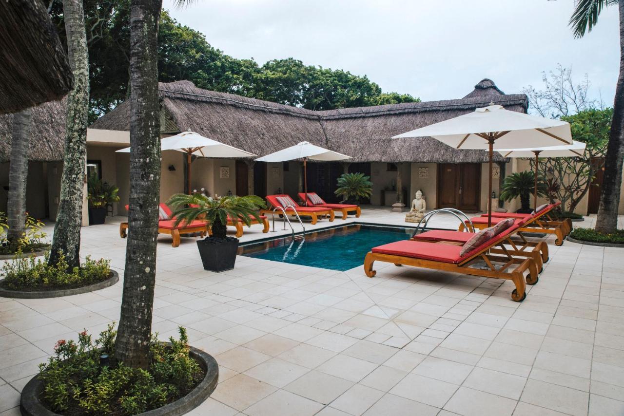 Constance Prince Maurice Poste de Flacq Exterior foto The pool at the Four Seasons Resort